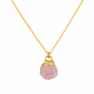 Necklace with a pink stone pendant on a gold chain against a white background