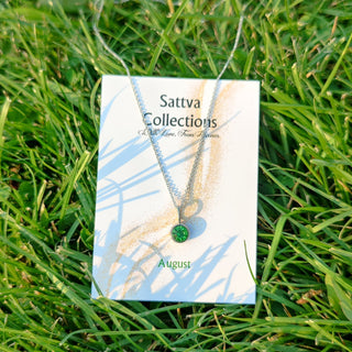 Sattva Collections necklace packaging on grass