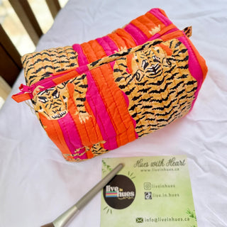 Colorful pouch with tiger design on a white surface, featuring branding text.