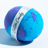Blue and purple bath bomb with 'Cotton Candy' label on a white background