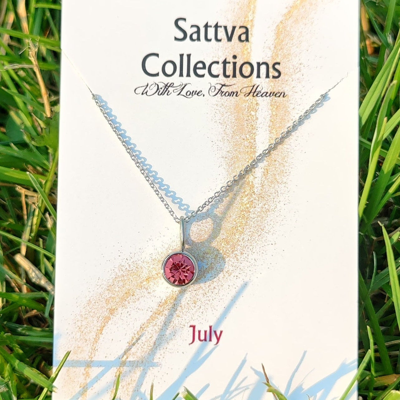 Sattva Collections necklace card on grass