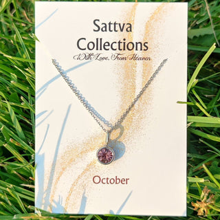 Sattva Collections necklace card on grass