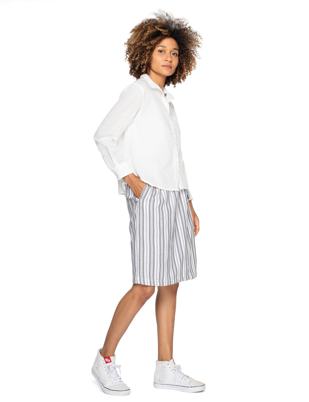Boxy like a boyfriend shirt but shorter. This button-up is the perfect mid-layer for the office, a casual date, or a business meeting. Made from slub cotton for a subtle texture throughout.
